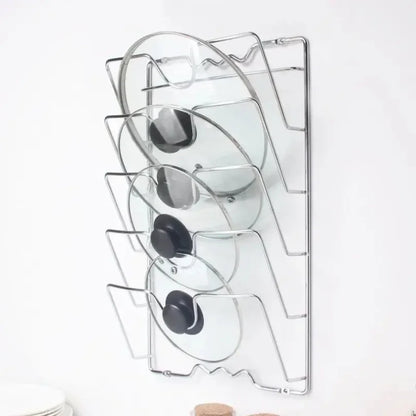 Rangement pour couvercle casserole mural argenté. 